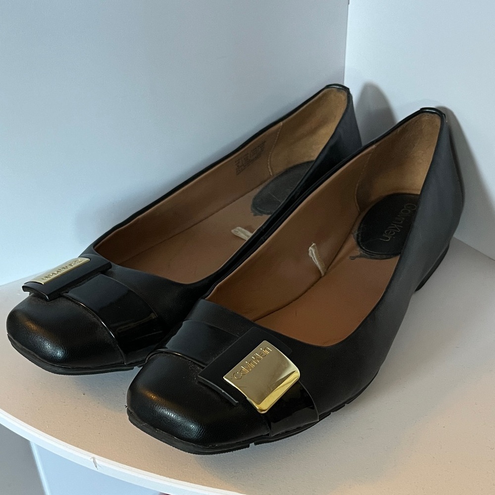 Calvin Klein Black Flats with Gold Accent